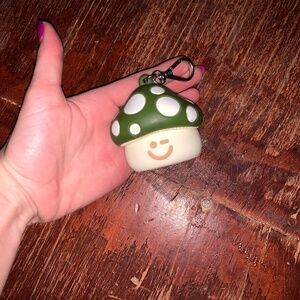 Hand sanitizer green mushroom with smiley face holder